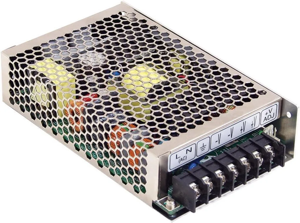 Rectangular metal power supply unit with ventilation slots and label