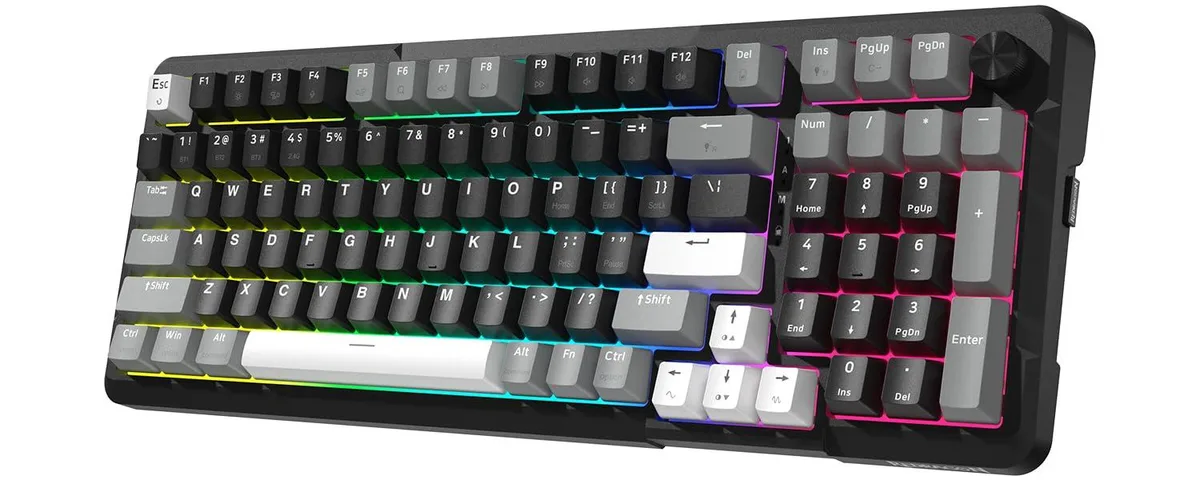 Black compact mechanical keyboard with volume knob and RGB lighting
