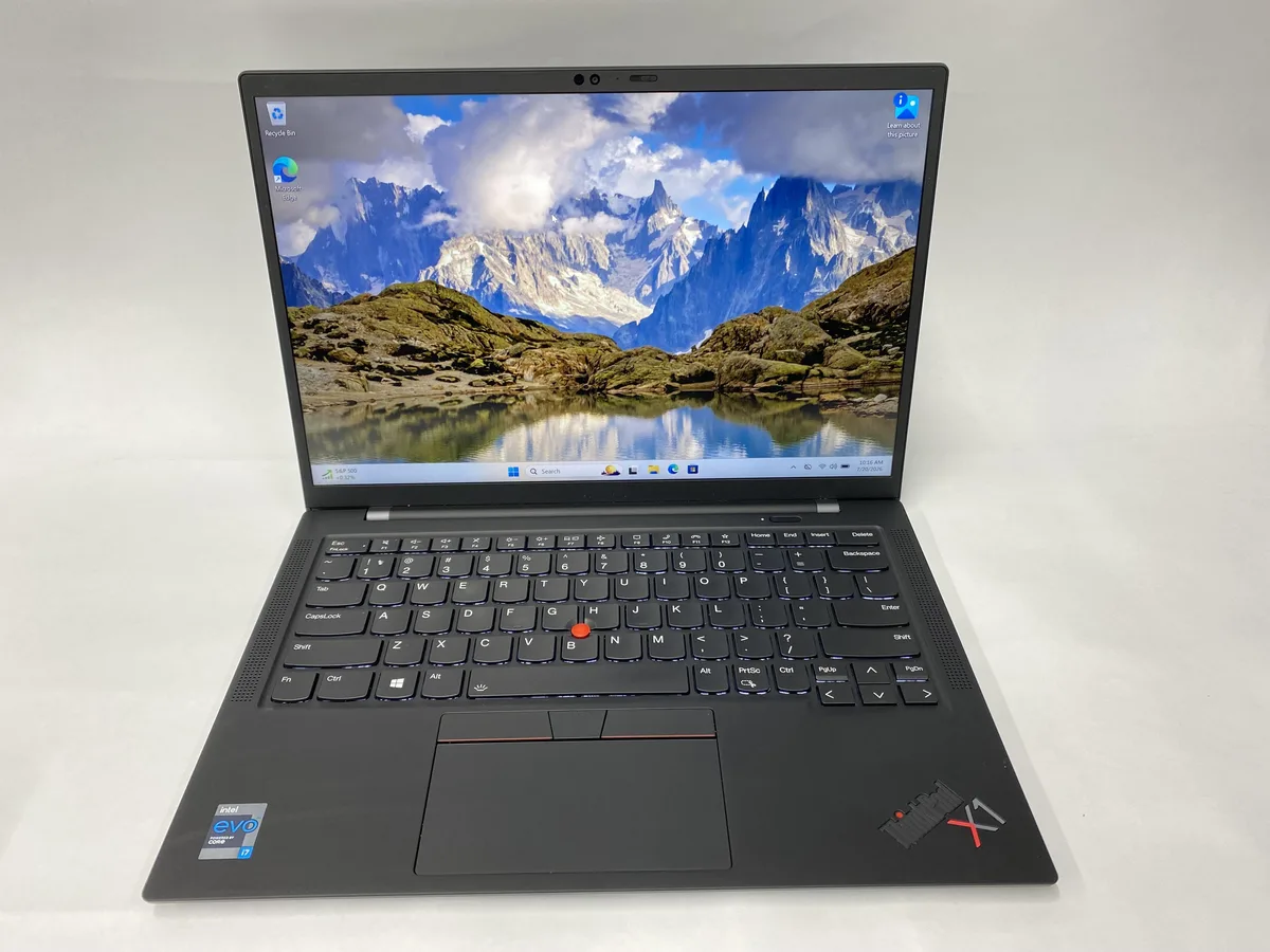 Slim silver 14 inch laptop with matte non-touch screen and charger