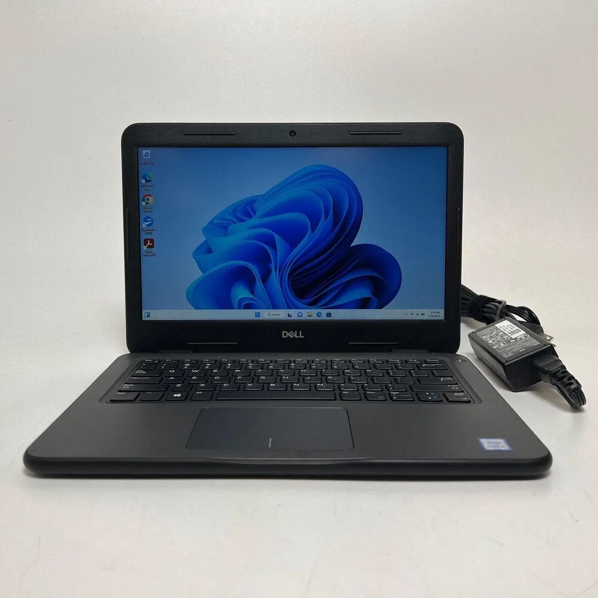 Silver Dell Latitude 3310 laptop, 13.3 inch HD screen, compact clamshell design