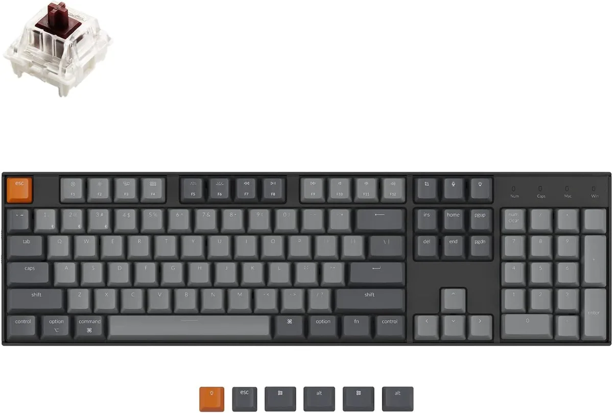 White full-size mechanical keyboard with 104 keys and brown switches