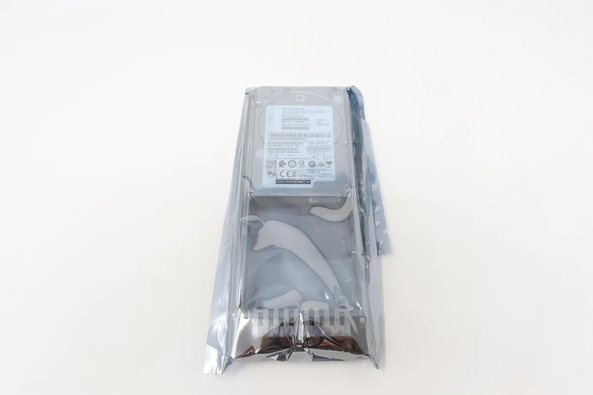 Silver rectangular 2.5 inch SAS hard drive with label showing 1.8TB capacity