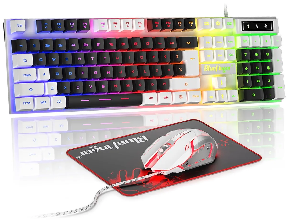 White full-size keyboard with black keycaps and matching black mouse with braided cable