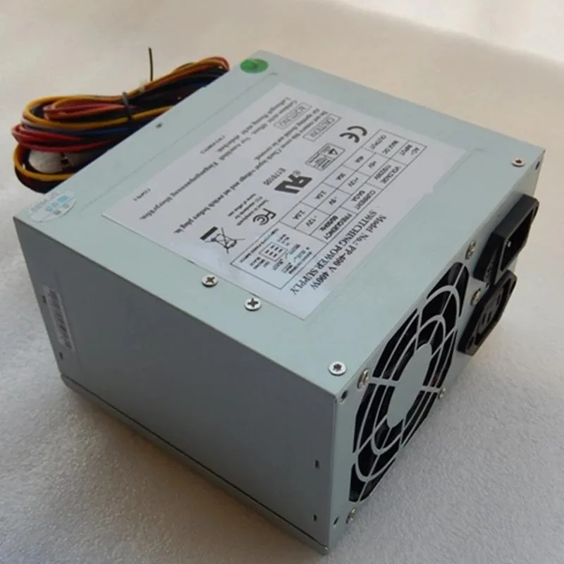 Rectangular silver ATX power supply with fan grille and power switch