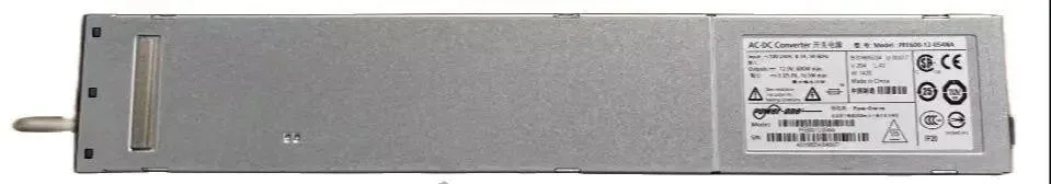 Rectangular silver metal redundant power supply module with front handle and ventilation grille