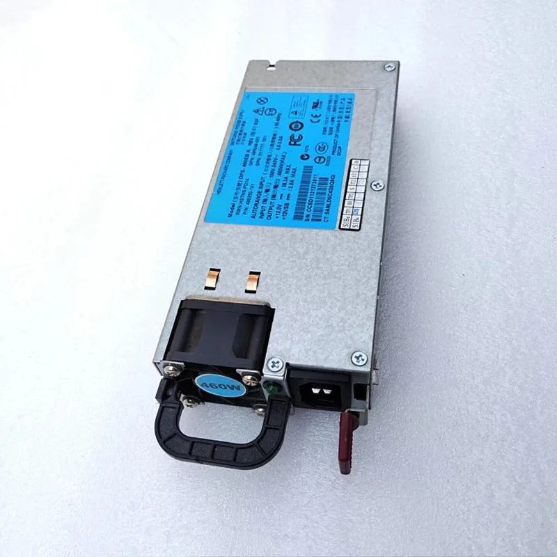 Rectangular silver metal power supply unit with ventilation grille and label showing 460W