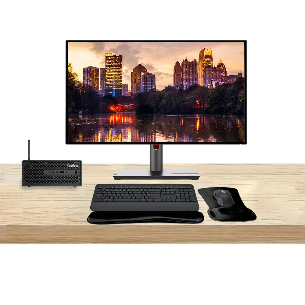 Compact black SFF tower, two 27-inch QHD monitors, graphite wireless keyboard and mouse