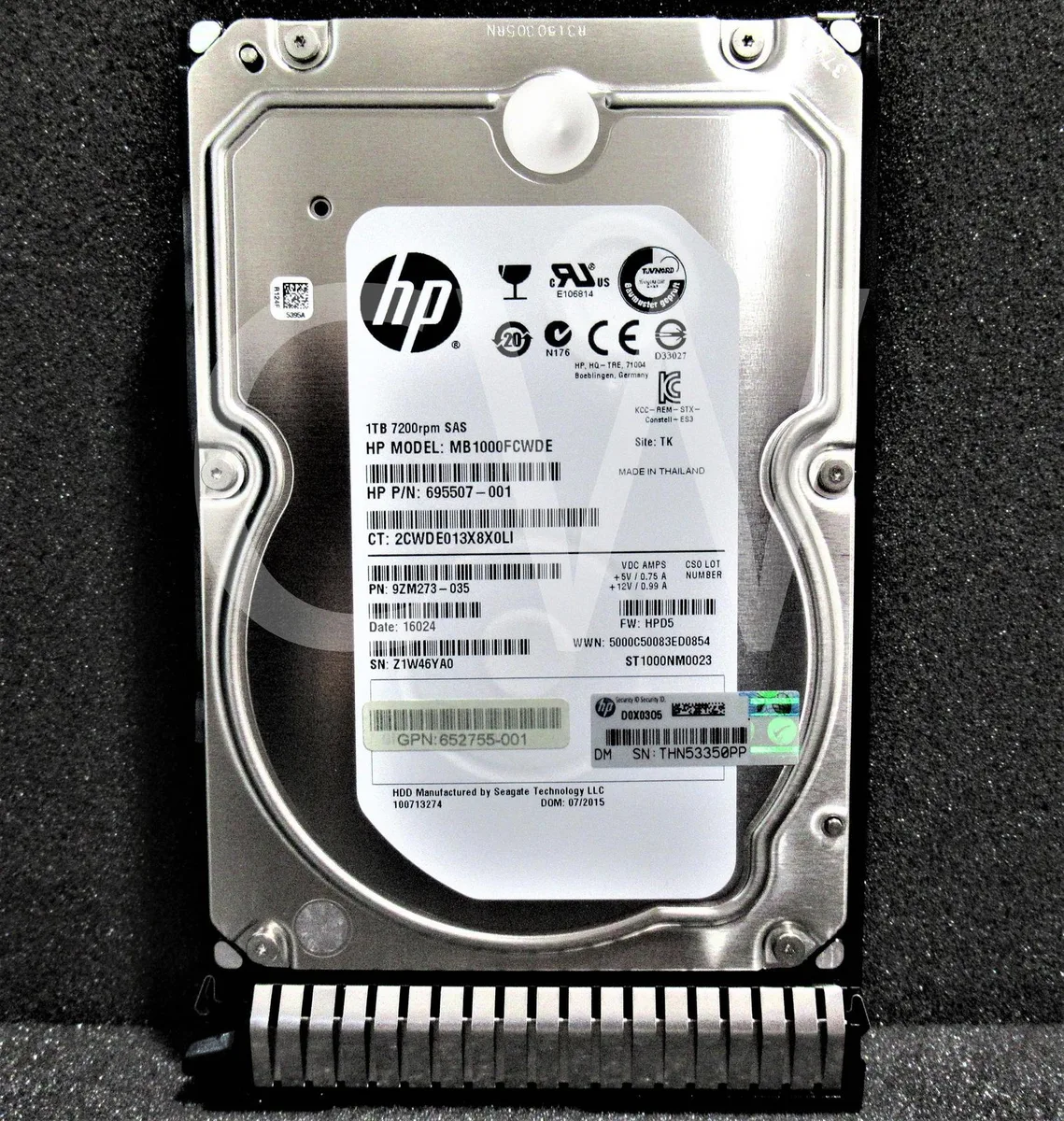 Silver 3.5 inch SAS hard drive in a black smart carrier caddy