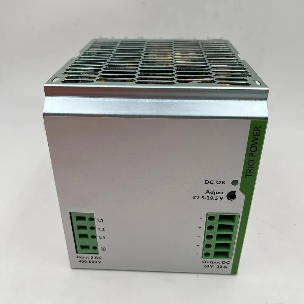 Rectangular ATX power supply unit with ventilation grille and cable bundle