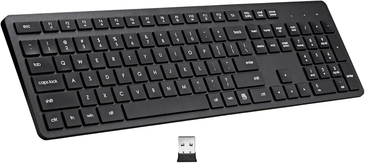 Black full-size wireless gaming keyboard with 106 keys and tilt angle