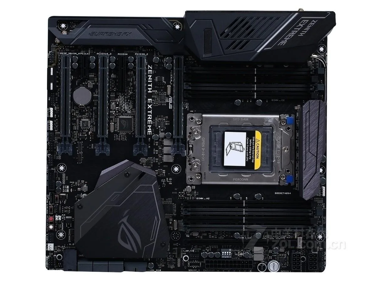 Large rectangular E-ATX motherboard in dark finish with multiple expansion slots and memory sockets
