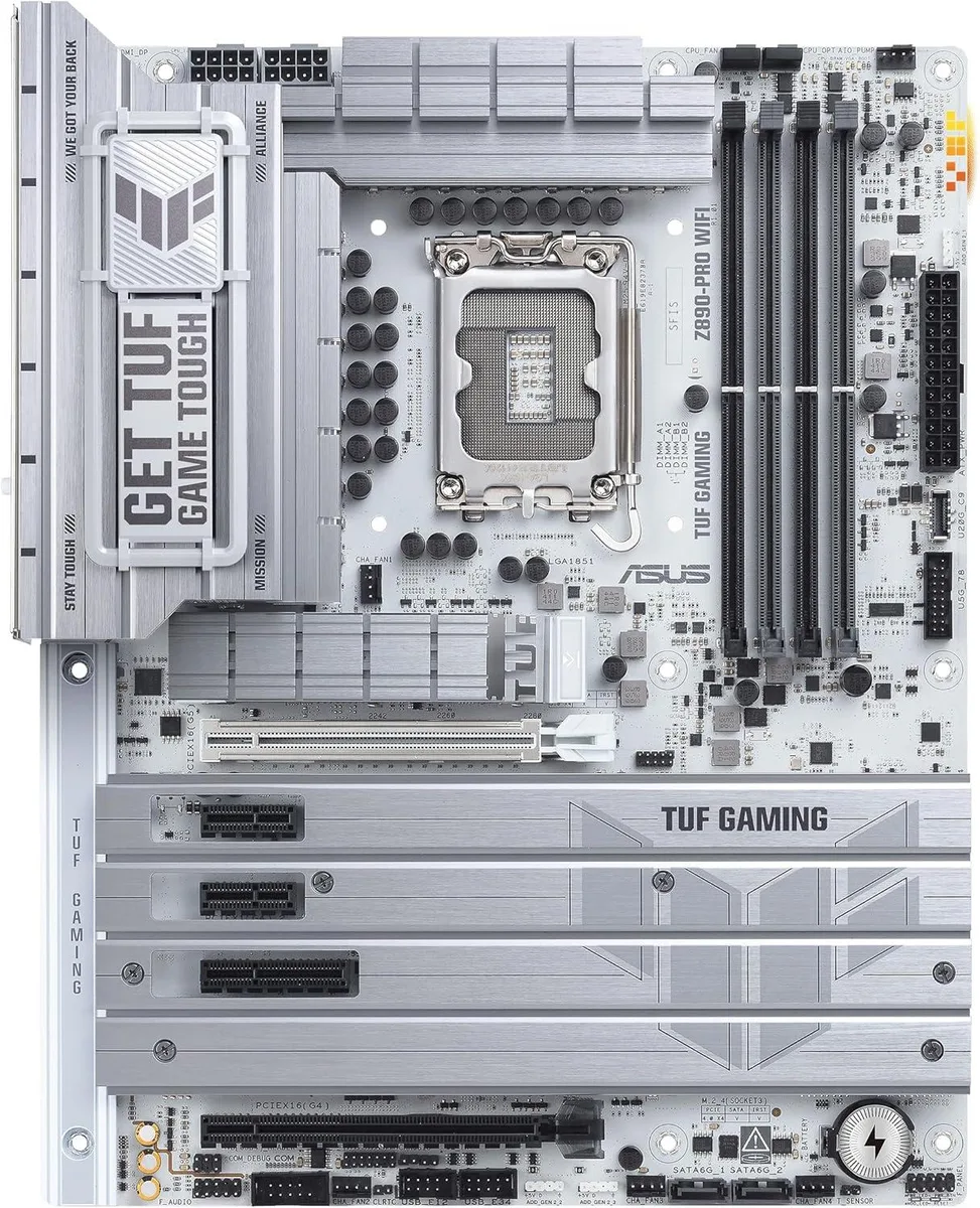 ATX motherboard dark PCB silver heatsinks LGA 1851 socket DDR5 slots