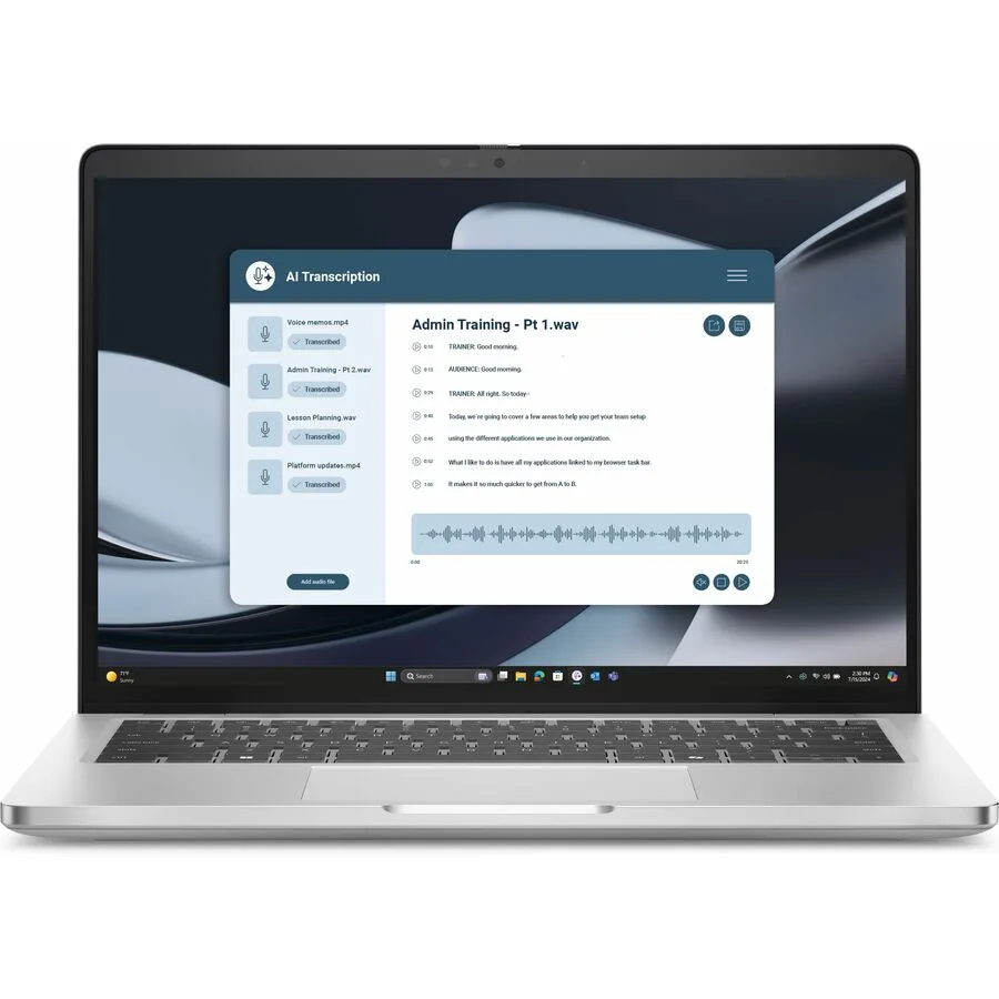 Dark grey clamshell laptop with 14 inch anti-glare screen, closed lid showing Copilot key