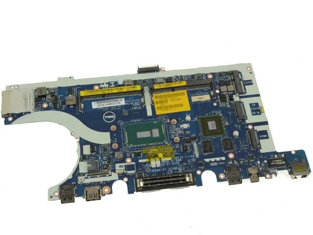 Green laptop motherboard with silver CPU socket and black heatsink, bare board layout visible