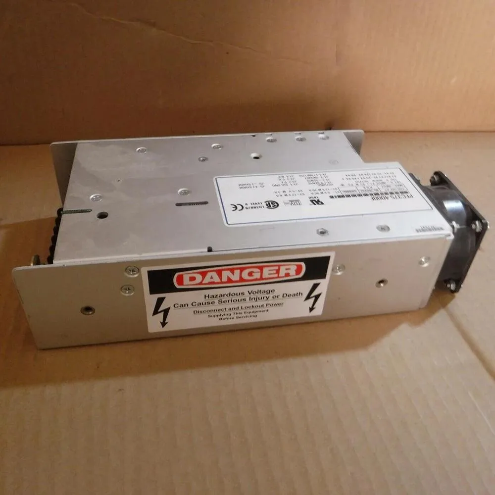 Rectangular ATX power supply unit with metal casing and fan grille, labelled PFC375-4000F