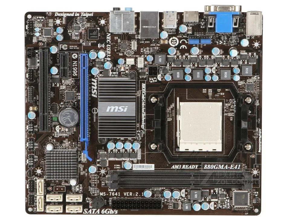 Green Micro ATX motherboard with black slots and silver heatsinks