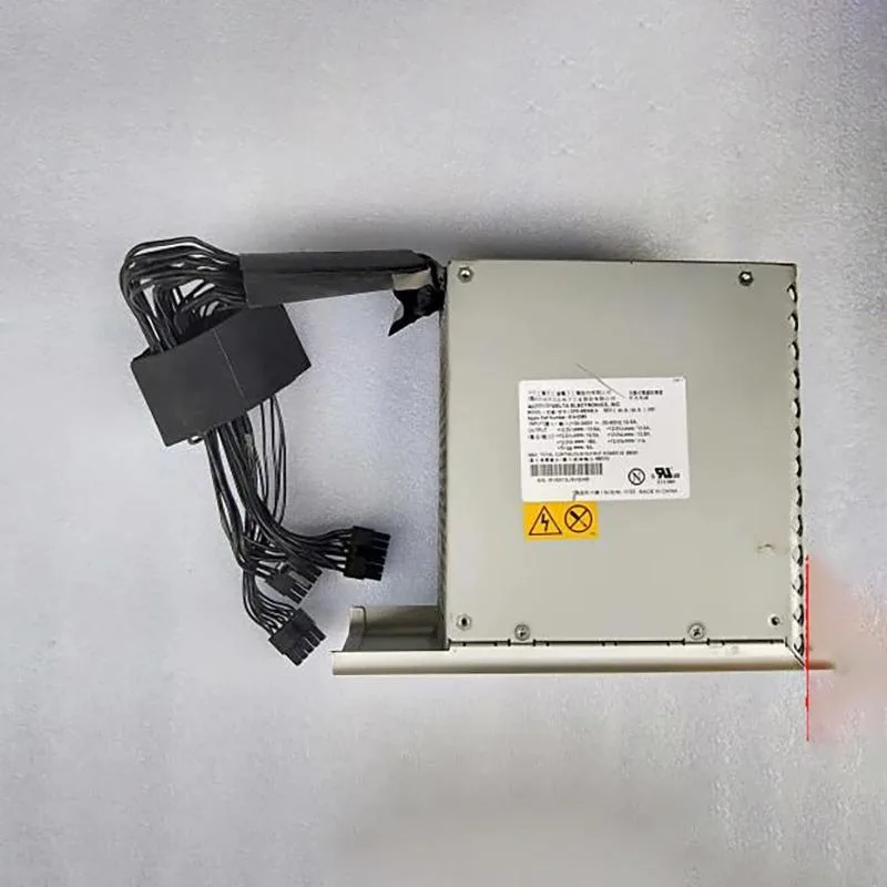 Black rectangular ATX power supply unit with ventilation grille and label showing 980W