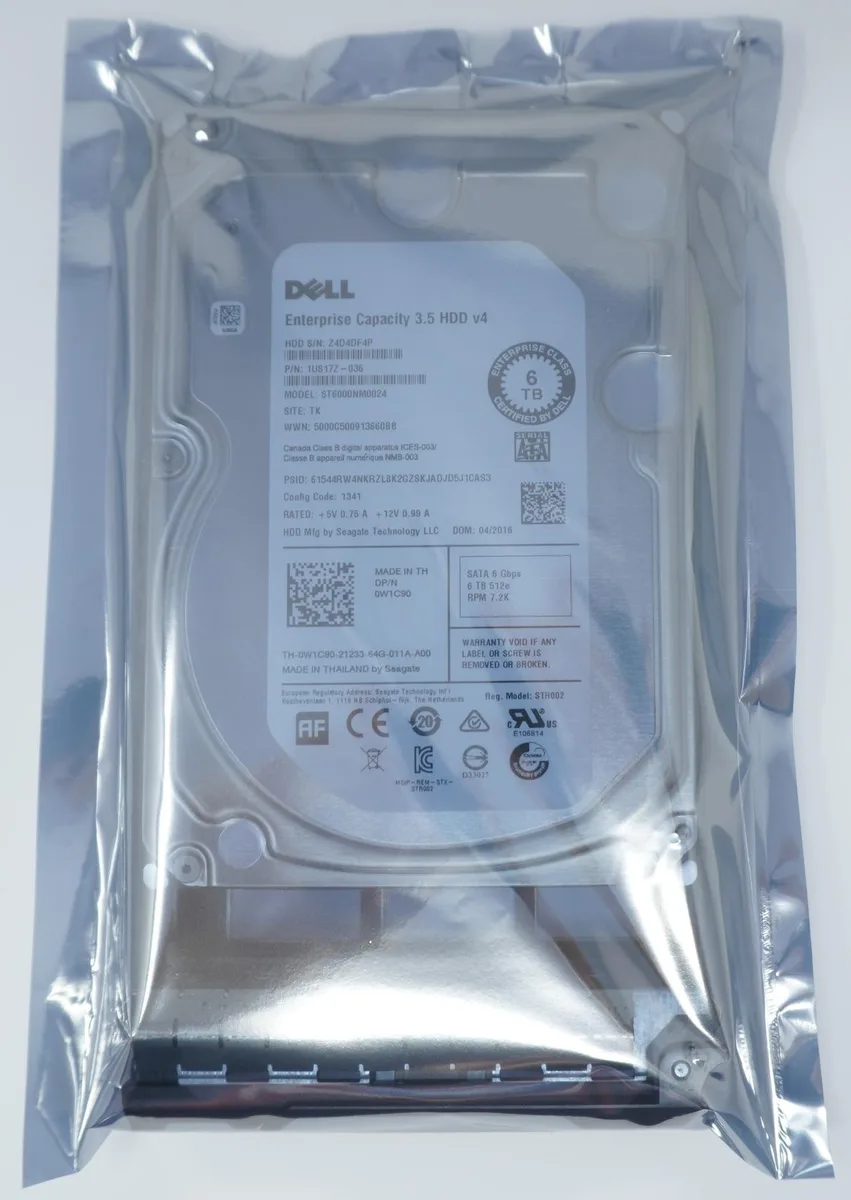 Silver 3.5 inch SATA hard drive with green circuit board visible