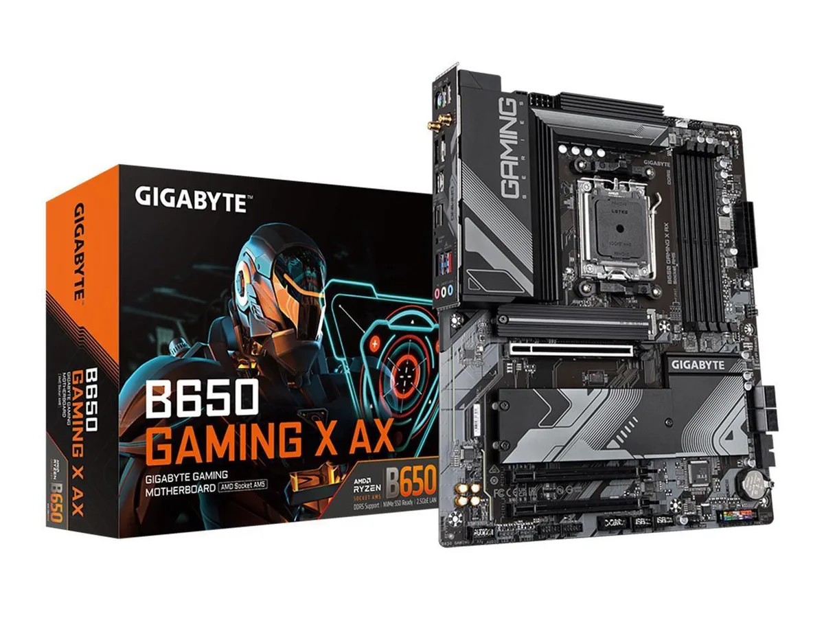 ATX motherboard, black PCB with silver heatsinks and I/O shield