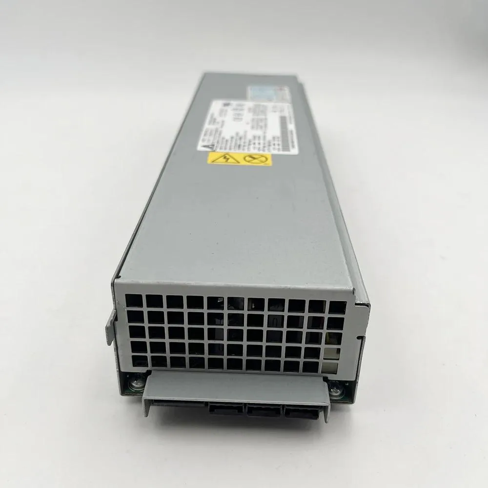Rectangular silver ATX power supply unit with fan grille and power connectors