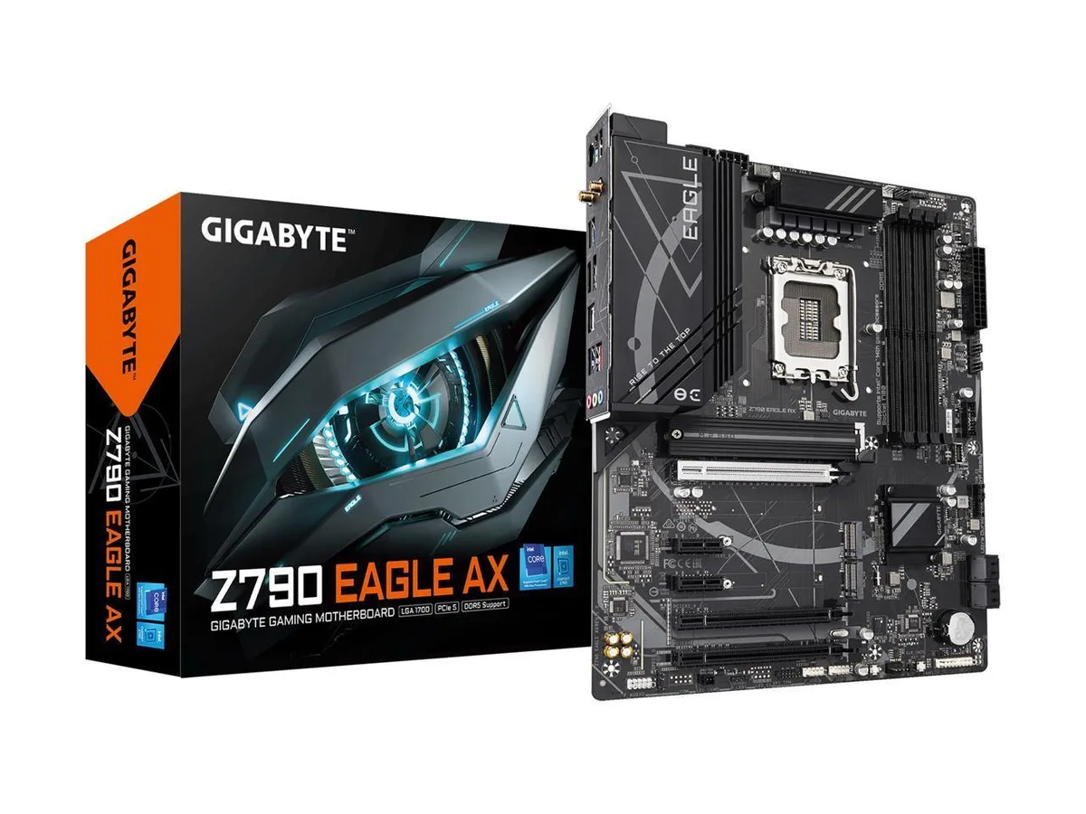 ATX motherboard with silver heatsinks and black PCB