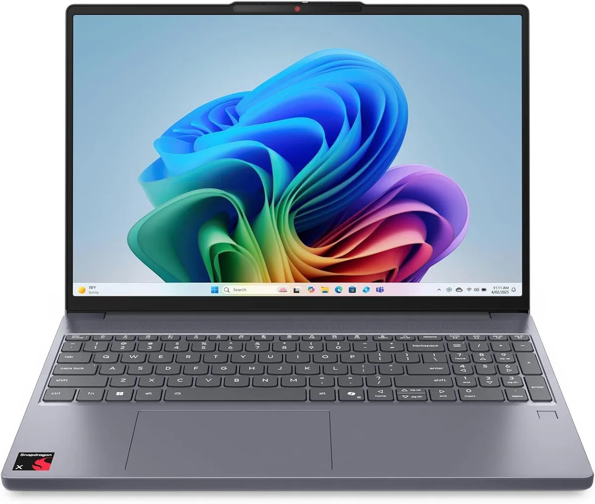 Thin silver-grey laptop with 15.3 inch screen and metal lid