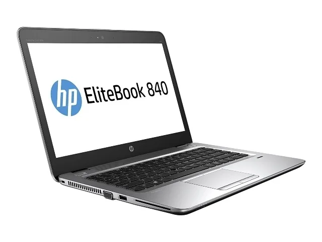 Silver 14 inch laptop closed on a plain background