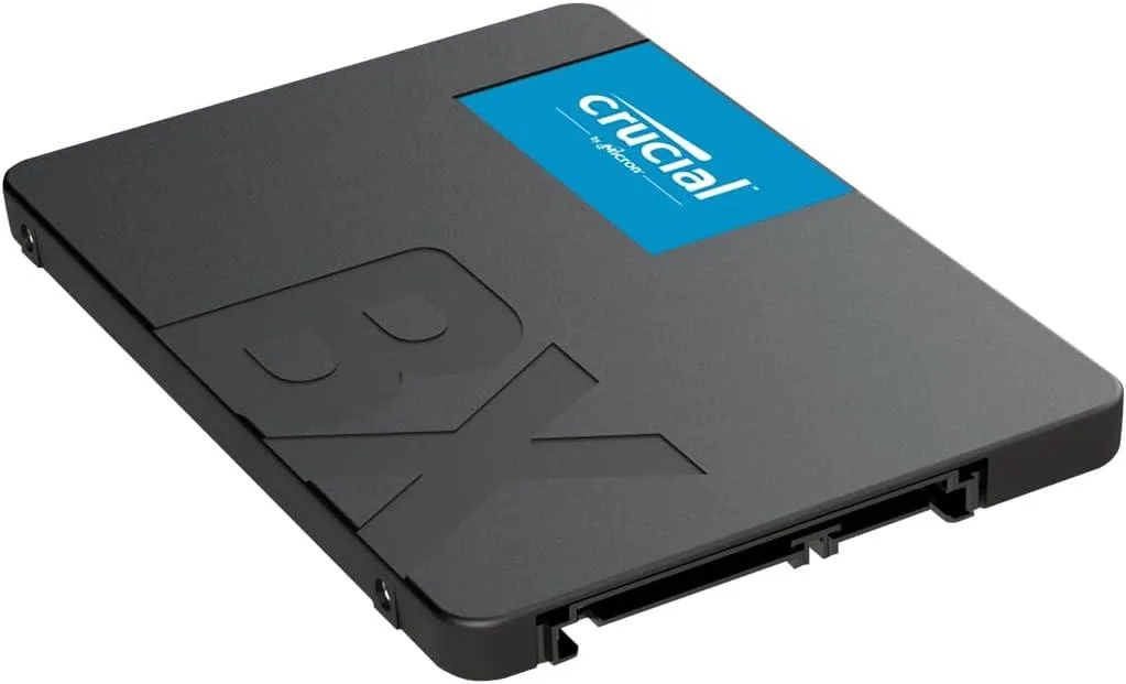 Black rectangular 2.5 inch SATA SSD with label showing Crucial BX500 500GB