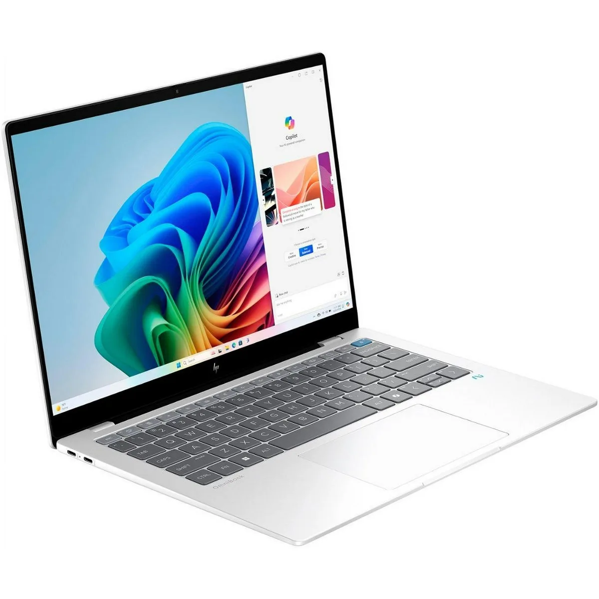 Silver 14-inch HP OmniBook X laptop with ION portable projector