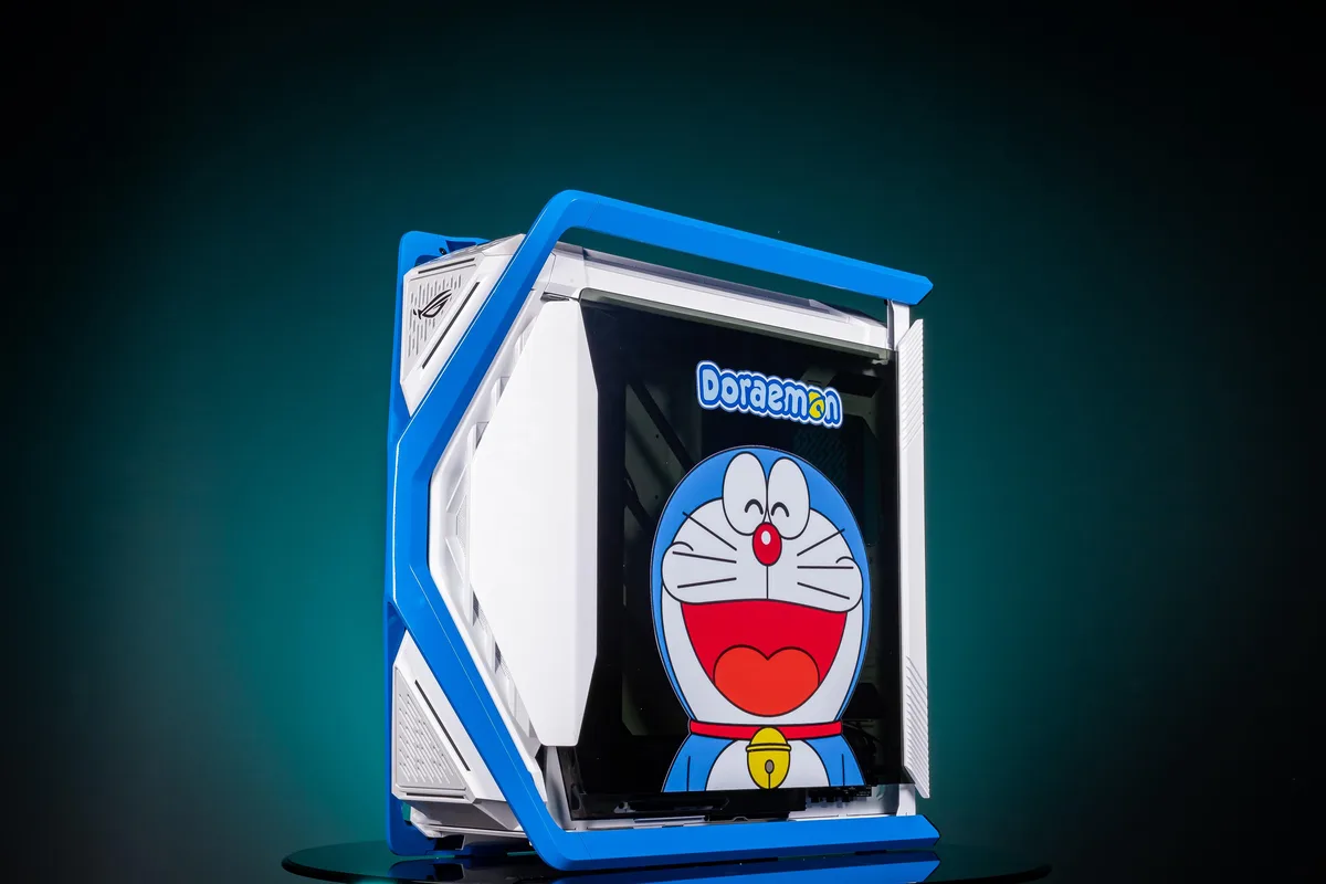 Full-tower E-ATX case with dual tempered glass panels, UV-printed Doraemon artwork, four pre-installed 140 mm fans