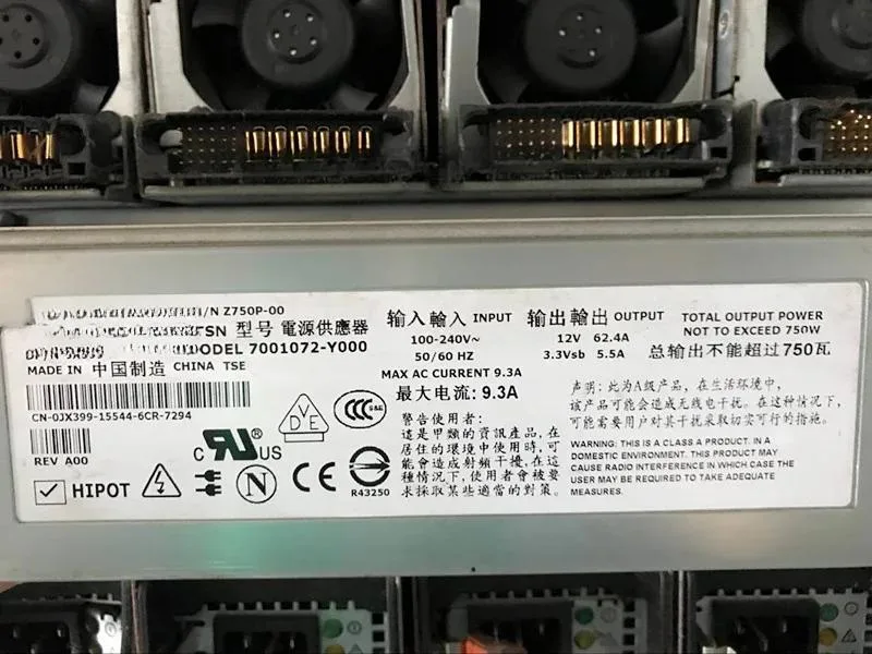 Rectangular silver server PSU with rear fan grille and model labels