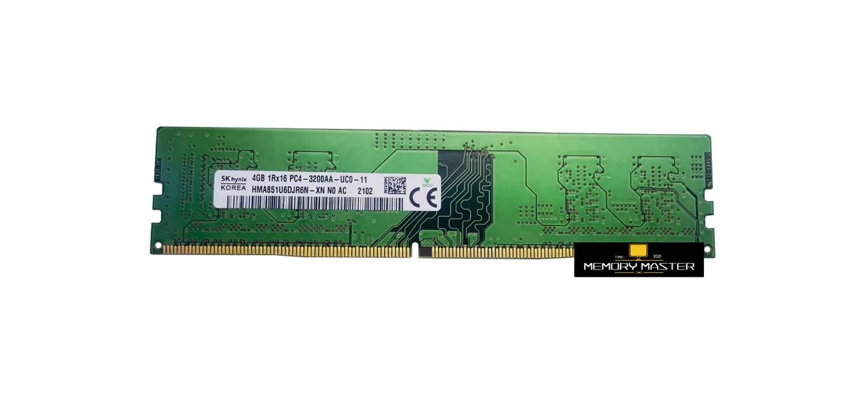 Green rectangular circuit board with gold contacts and black memory chips