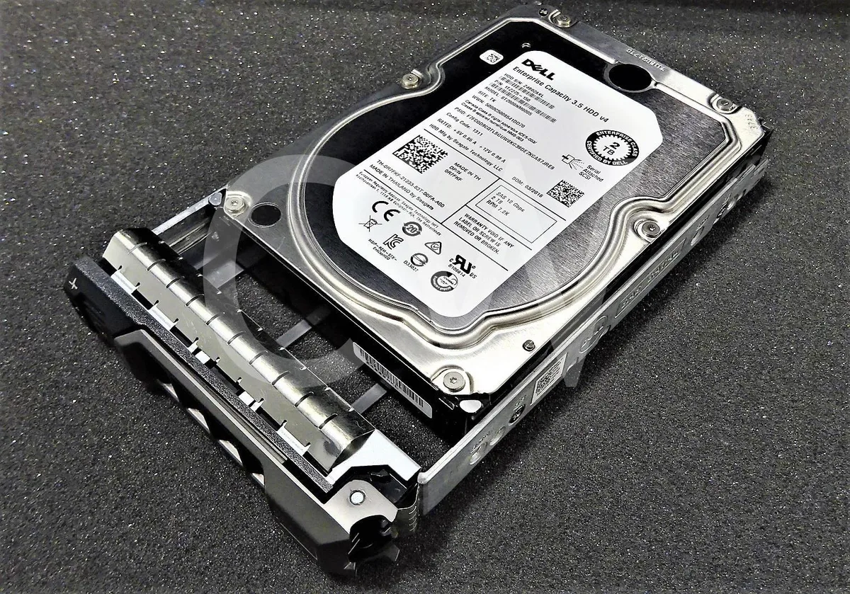 Silver 3.5 inch hard drive mounted in black Dell caddy tray