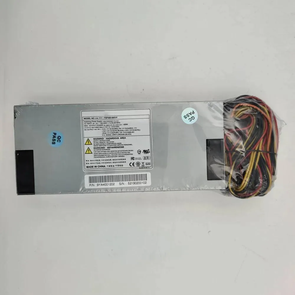 Rectangular silver metal 1U server power supply unit with rear fan grille and power socket