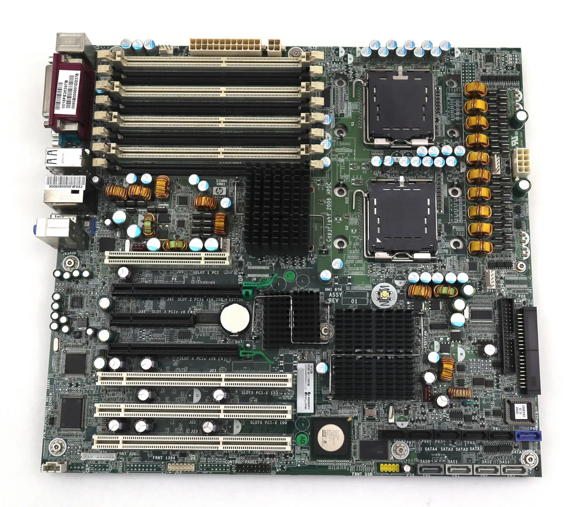 Green rectangular motherboard with dual CPU sockets and multiple expansion slots