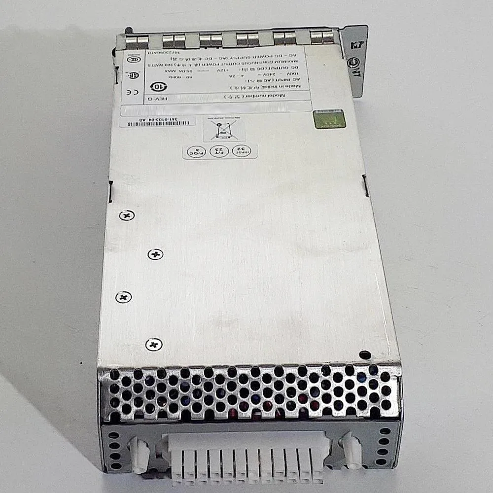 Rectangular silver ATX power supply unit with rear fan grille and power connector