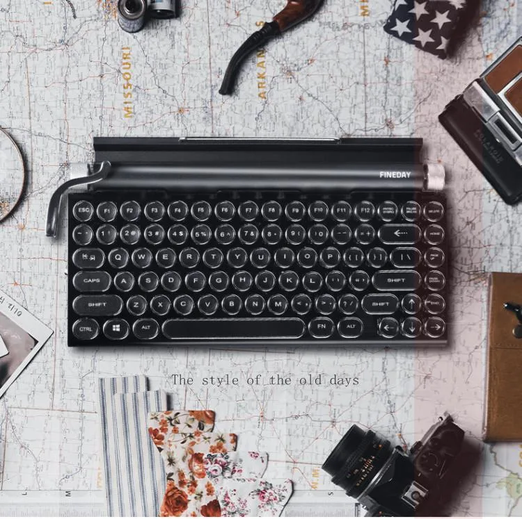 Compact black mechanical keyboard with 83 retro round keycaps and integrated palm rest