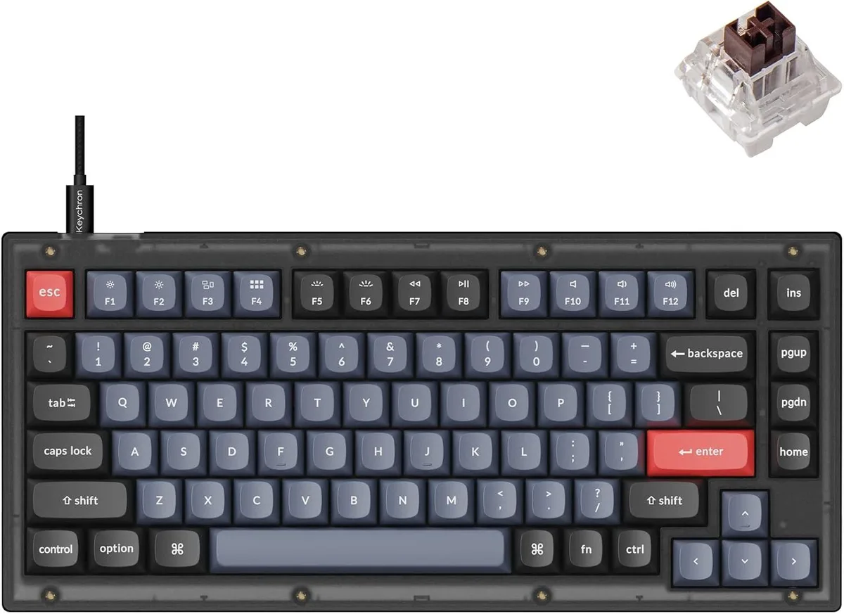 Compact 82-key mechanical keyboard in frosted black, 75% layout with translucent brown switches