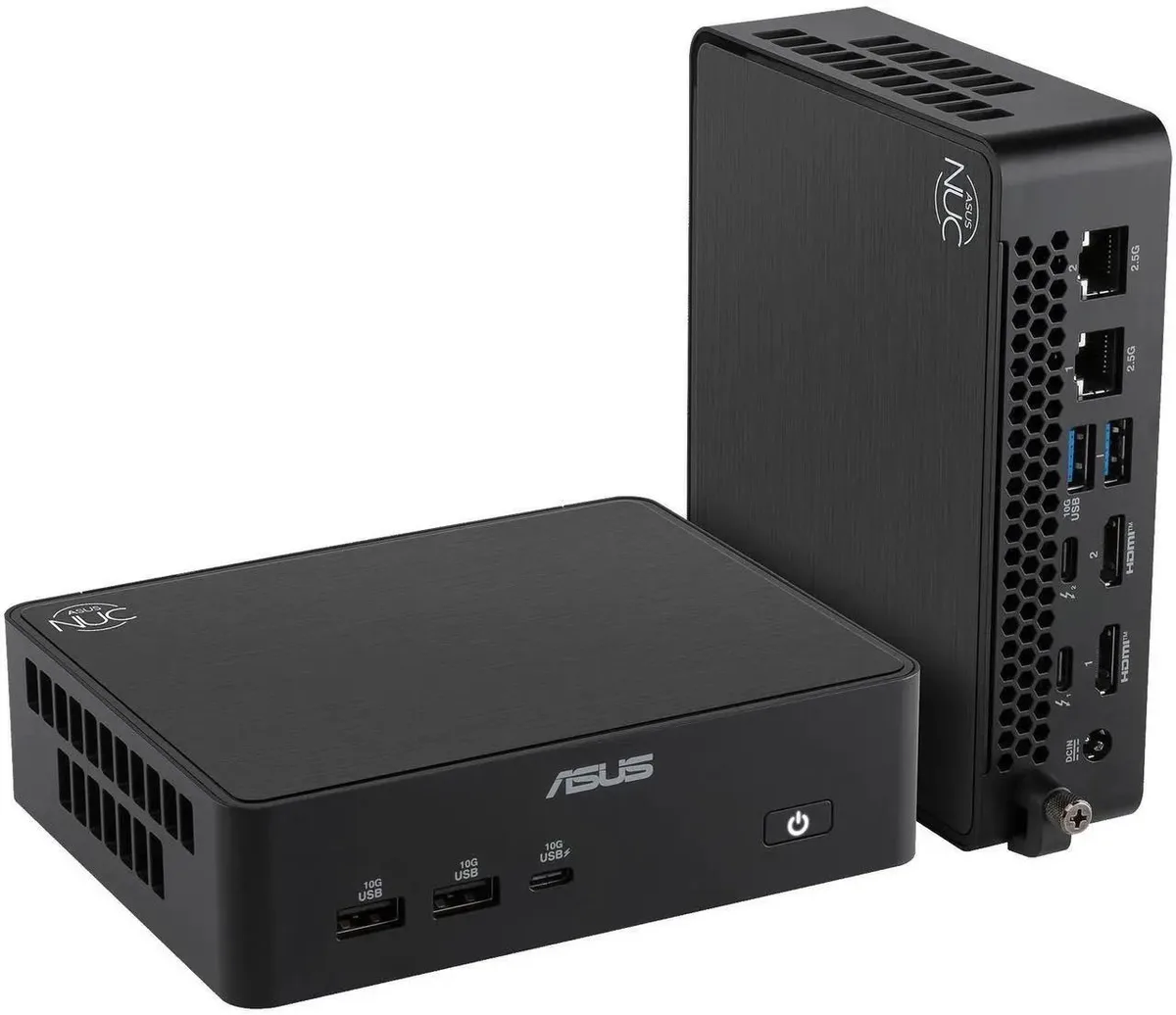 Small square mini PC with matte black finish and silver vented top, VESA bracket attached