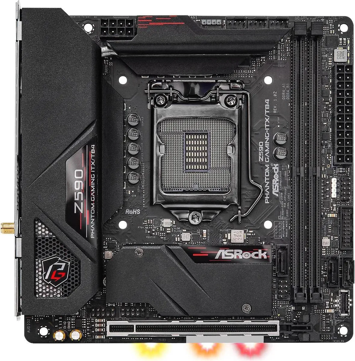 Compact black Mini-ITX board with silver heatsinks and rear I/O shield