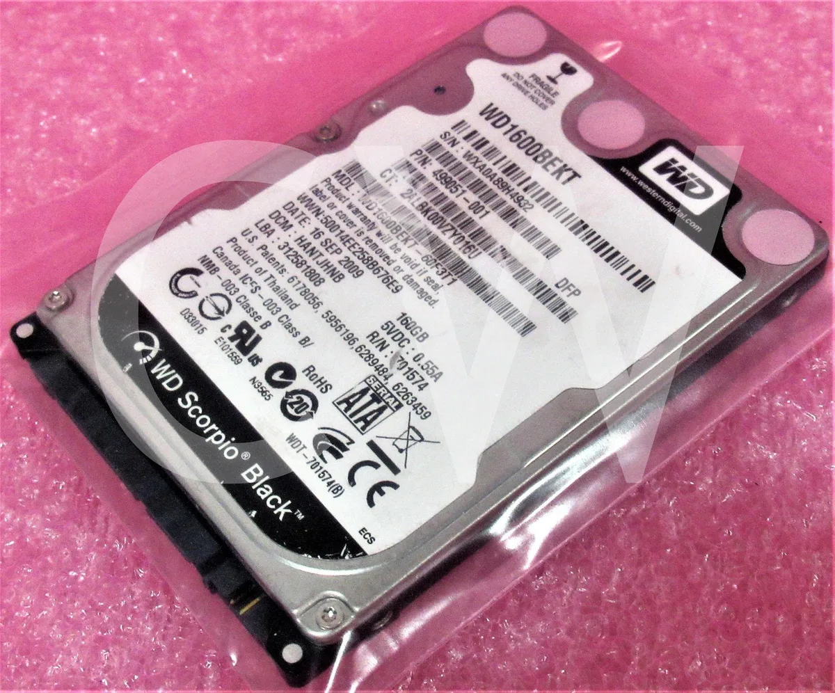 Silver 2.5 inch bare SATA hard drive with circuit board visible