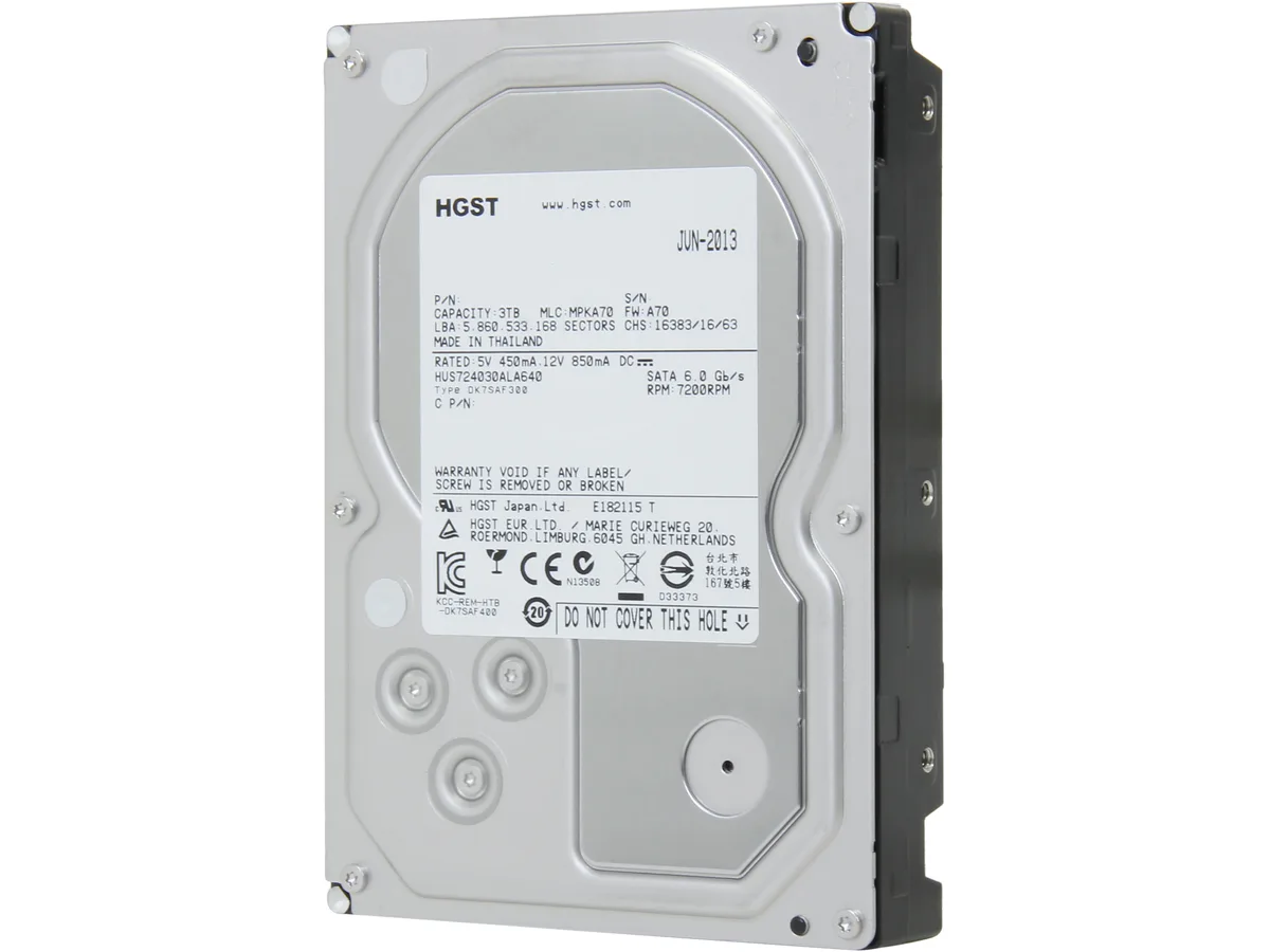 Silver 3.5 inch bare hard drive with exposed circuit board