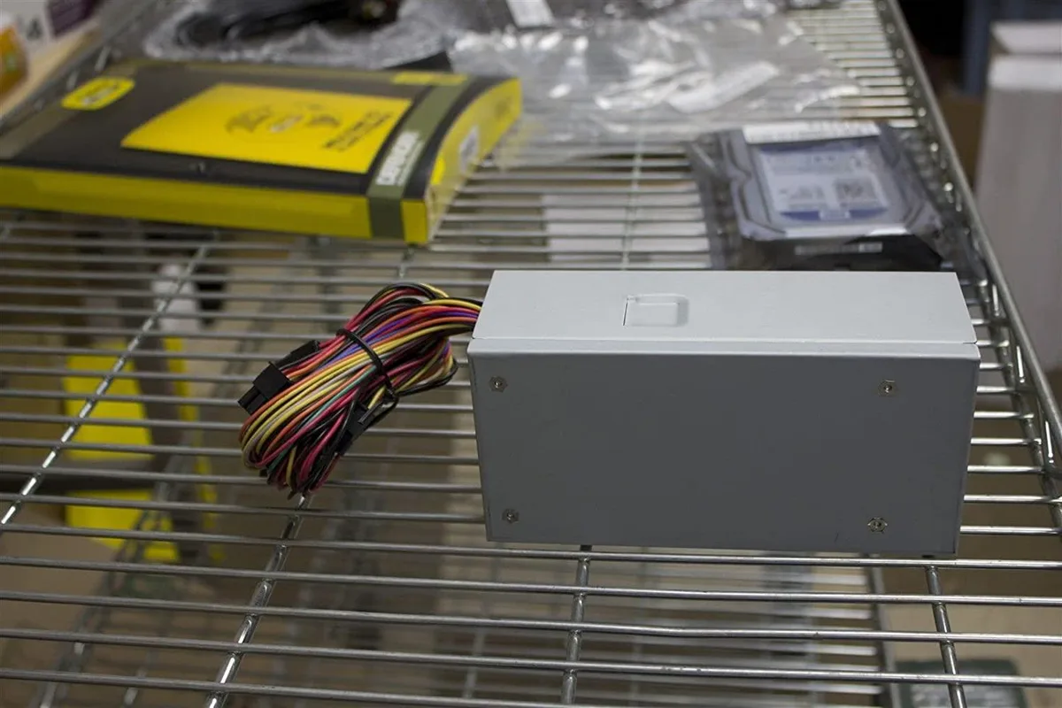 Compact TFX power supply unit with 80mm fan and SATA connectors