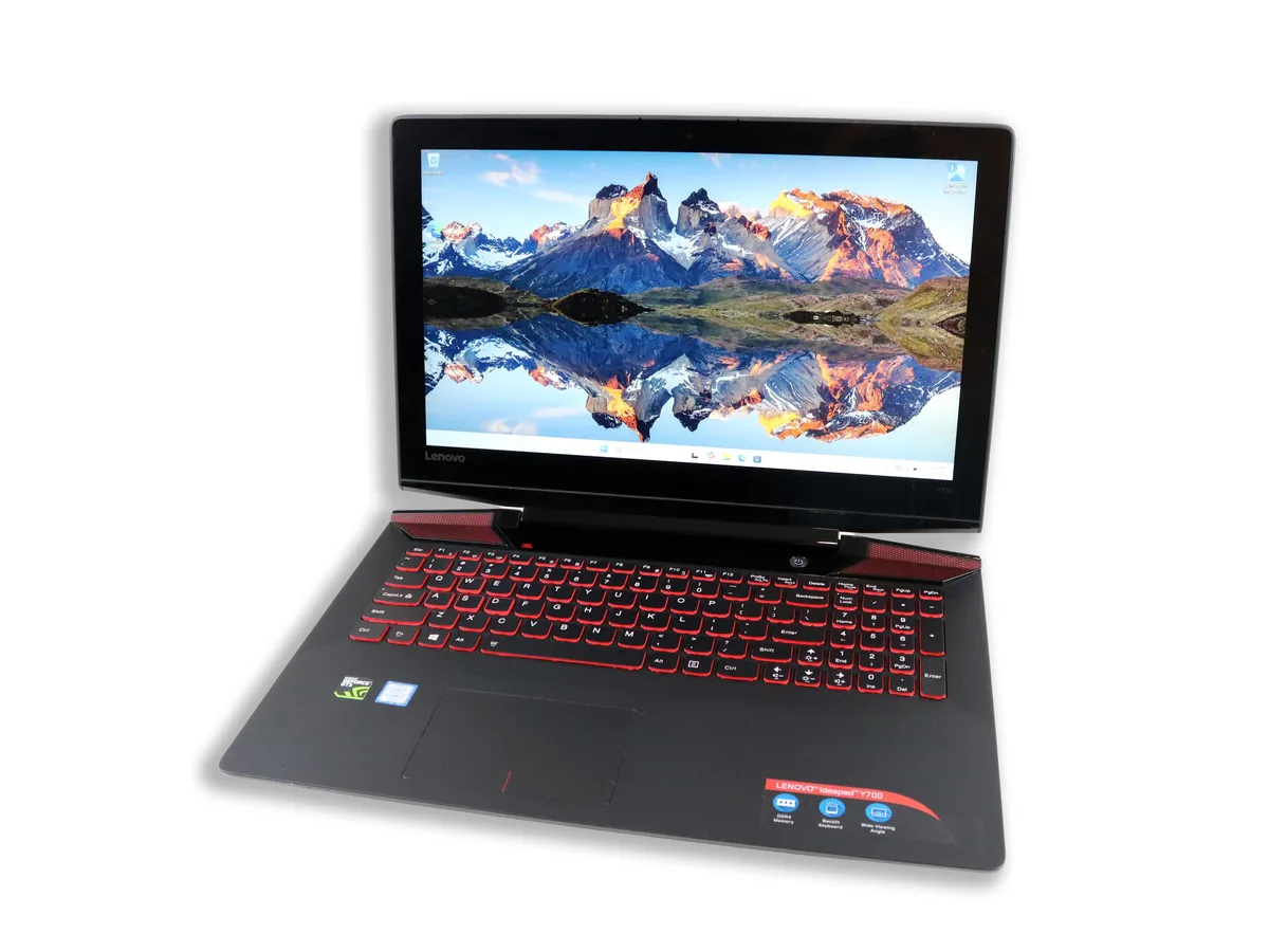 Black 15.6 inch gaming laptop with red backlit keyboard and angular vents