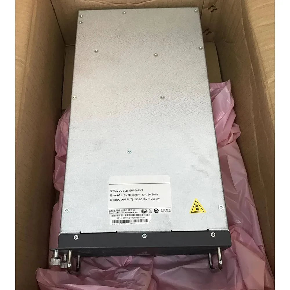 Rectangular silver metal power supply module with ventilation slots and label