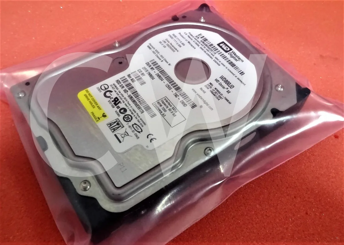 Silver 3.5 inch SATA hard drive with circuit board visible
