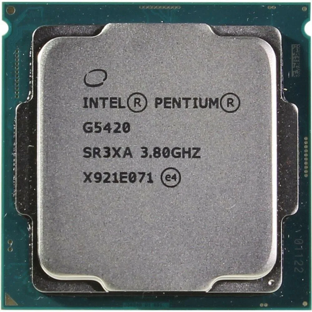 Silver square desktop processor with gold contact pads on green substrate