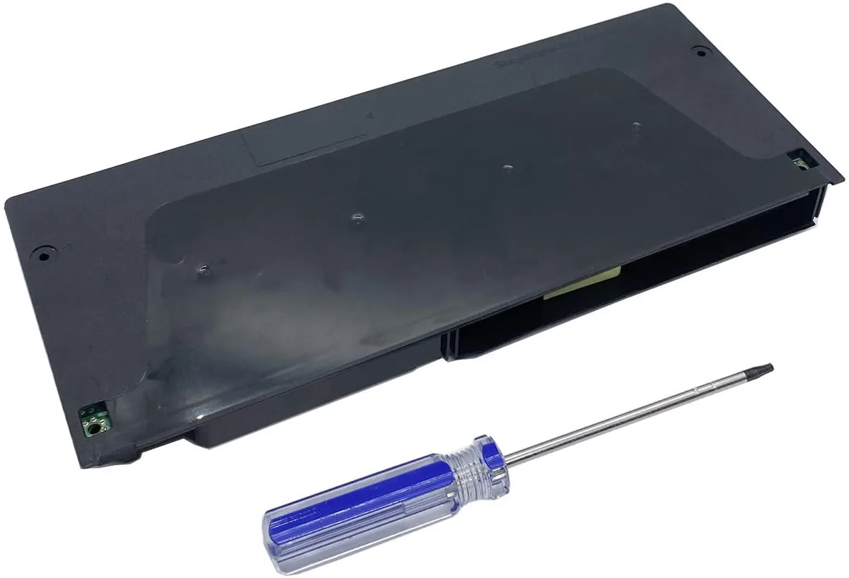 Black rectangular power supply unit with label ADP-160FR