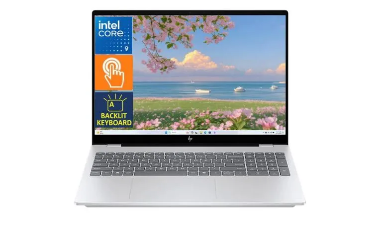 Silver 16-inch OLED touchscreen laptop, thin profile, backlit keyboard with numeric keypad