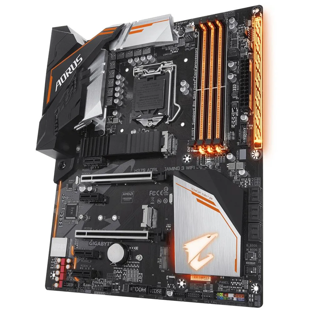 ATX motherboard with black PCB and silver heatsinks